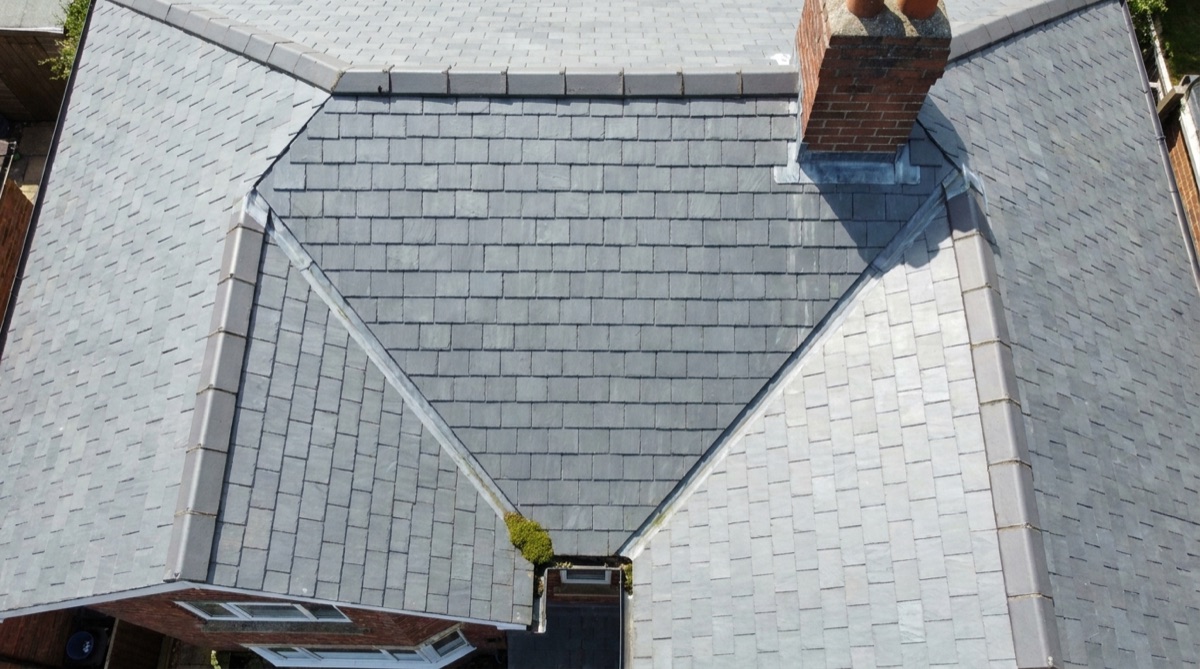 Aerial view of a well-kept slate roof in good condition